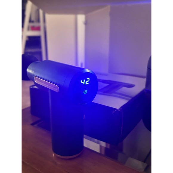 Small massage, gun, small, but mighty works as well as the big bulky handheld - Picture 8 of 11